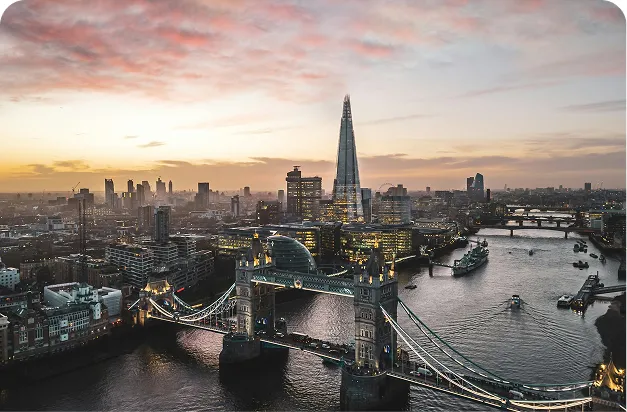Tower Bridge and the London skyline at sunset