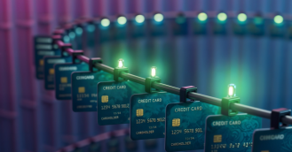 A string of credit cards on a conveyer belt, signifying a card vault.