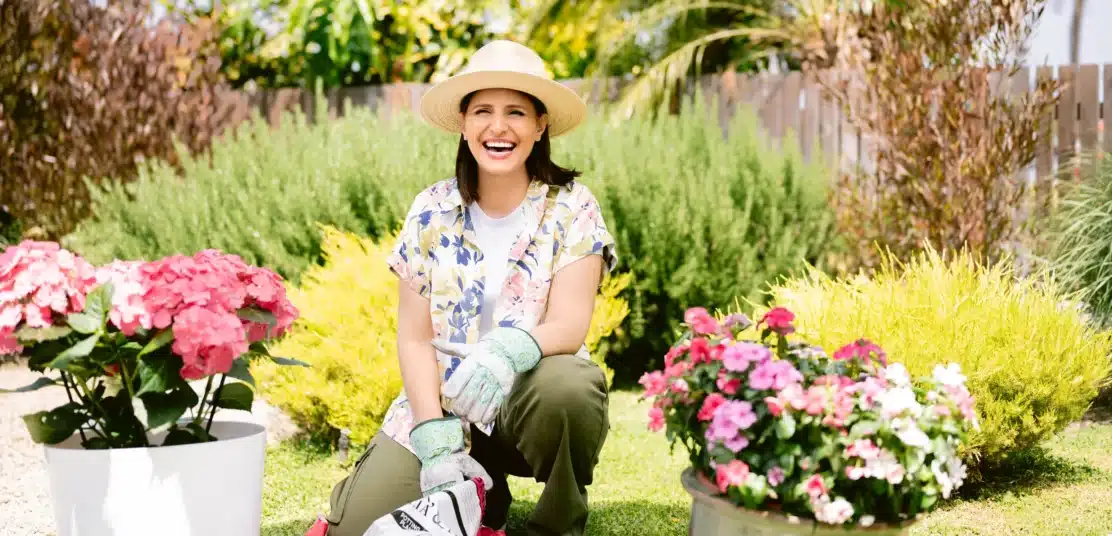 Deniz Ertan working in the garden