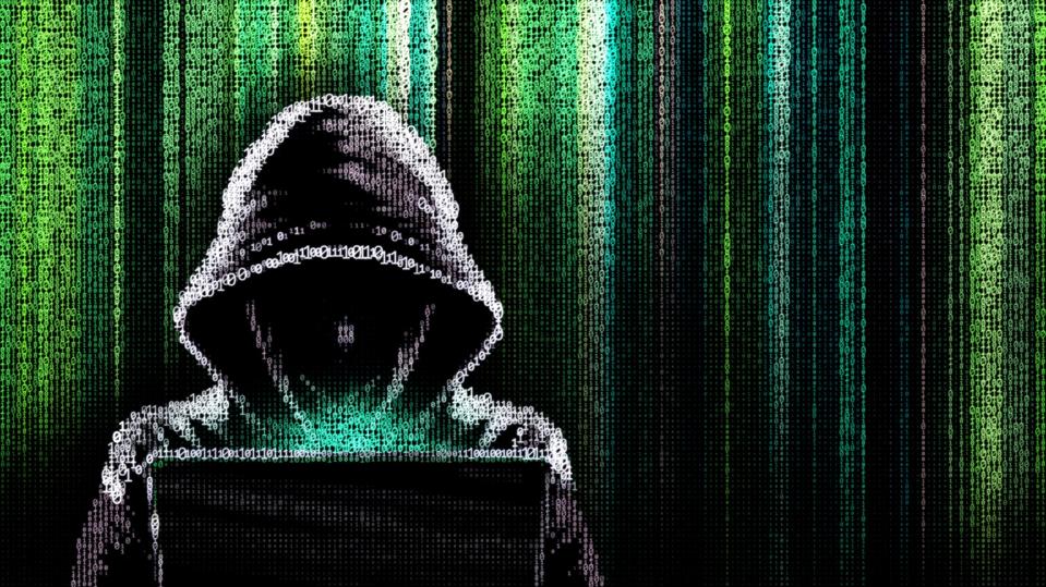illustration of a hacker made out of binary code