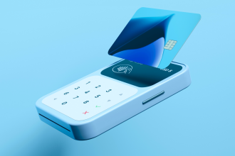 3D render of a payment terminal with a credit card tapping the contactless reader, representing 3DS transaction authentication